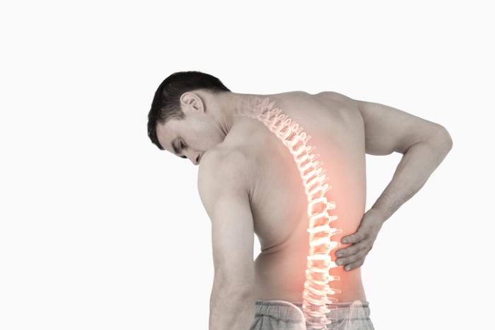What causes a pain in the back in the kidney area?