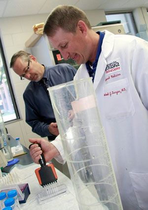 Researchers working in the lab