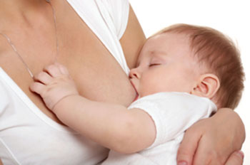 An infant breastfeeding