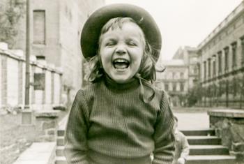 Vintage photograph of girl laughing