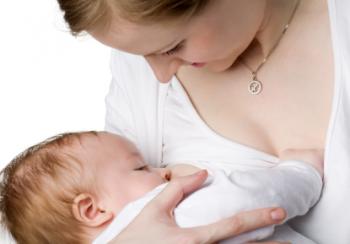 Woman breastfeeding child