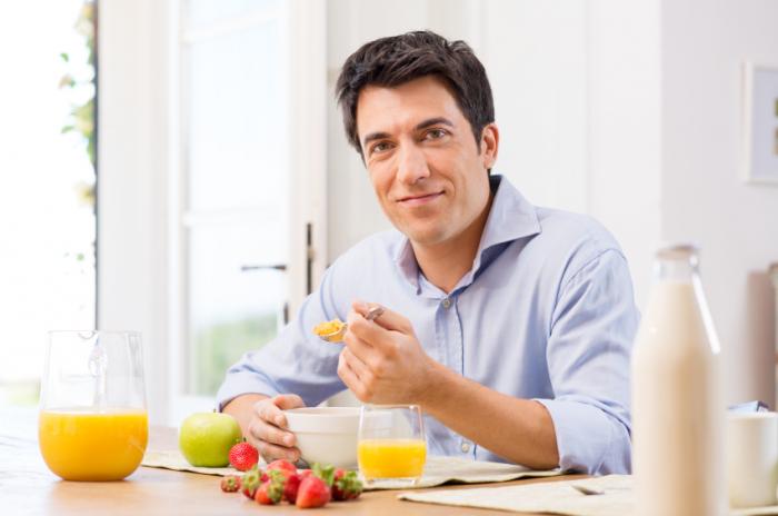 Man eating breakfast.
