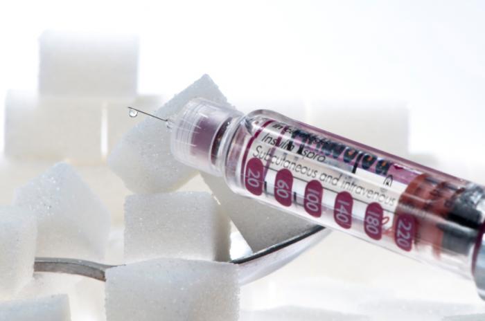 sugar cubes and insulin needle