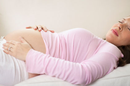 A pregnant woman resting